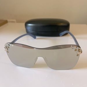 Jimmy Choo mirrored sunglasses with fancy details on the sides.